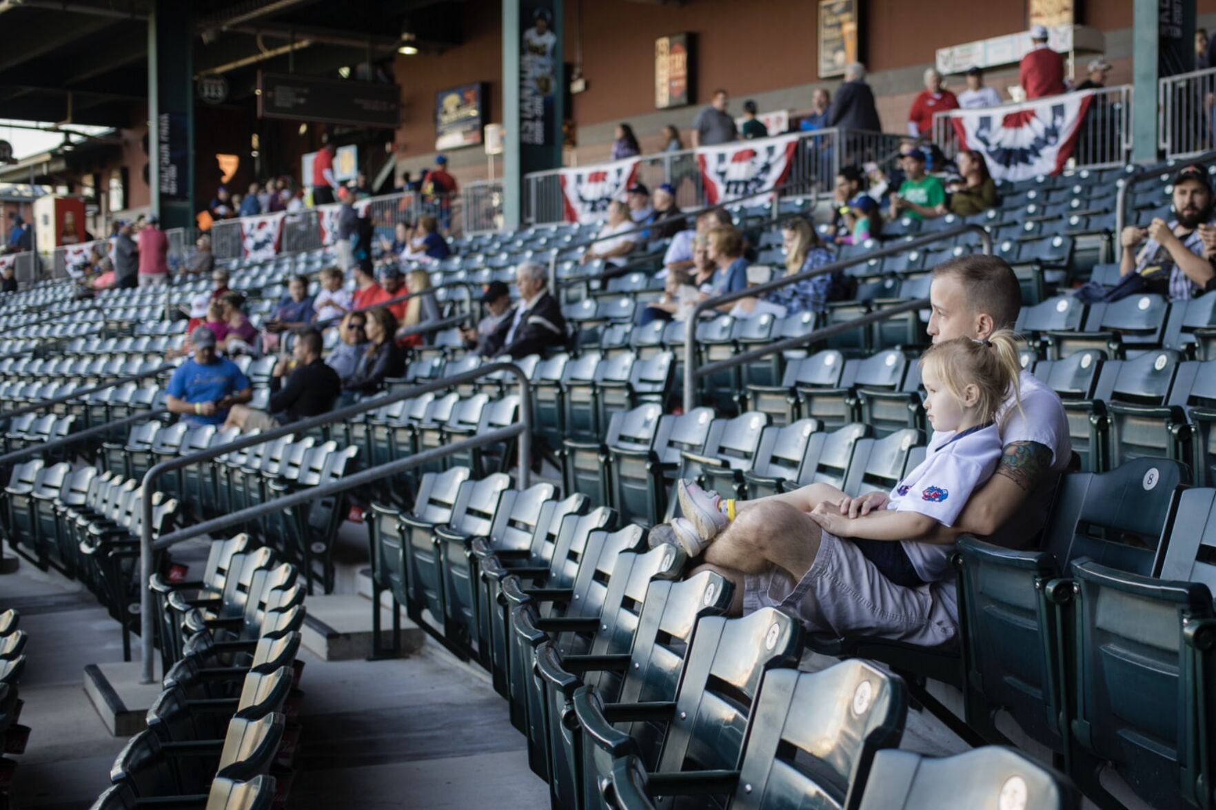 Father and Daughter at Baseball Game